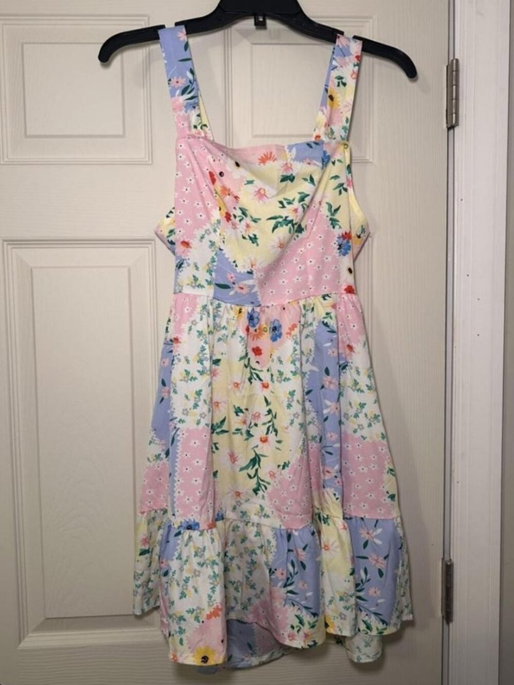 Pastel floral mini dress with bow in the back